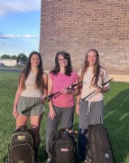 Melissa-L-Bautz-center-works-with-apprentices-Elisabetha-Olsson-left-and-Juliet-Whitmore-right-all-of-Lander